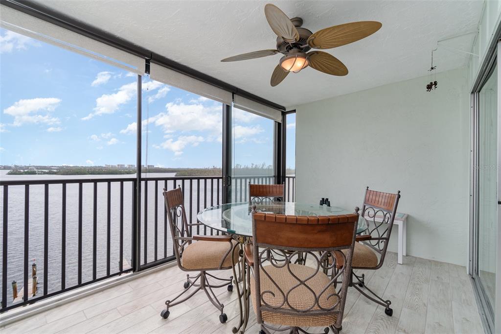 9011 Midnight Pass Road, Unit 329 Sarasota, FL 34242 - Photo 2 of 39 a view of a dining room with furniture window and outside view