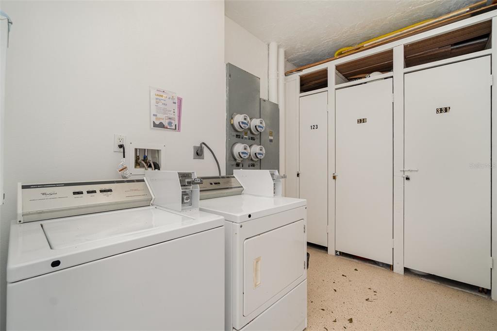 9011 Midnight Pass Road, Unit 329 Sarasota, FL 34242 - Photo 31 of 39 a view of washer and dryer
