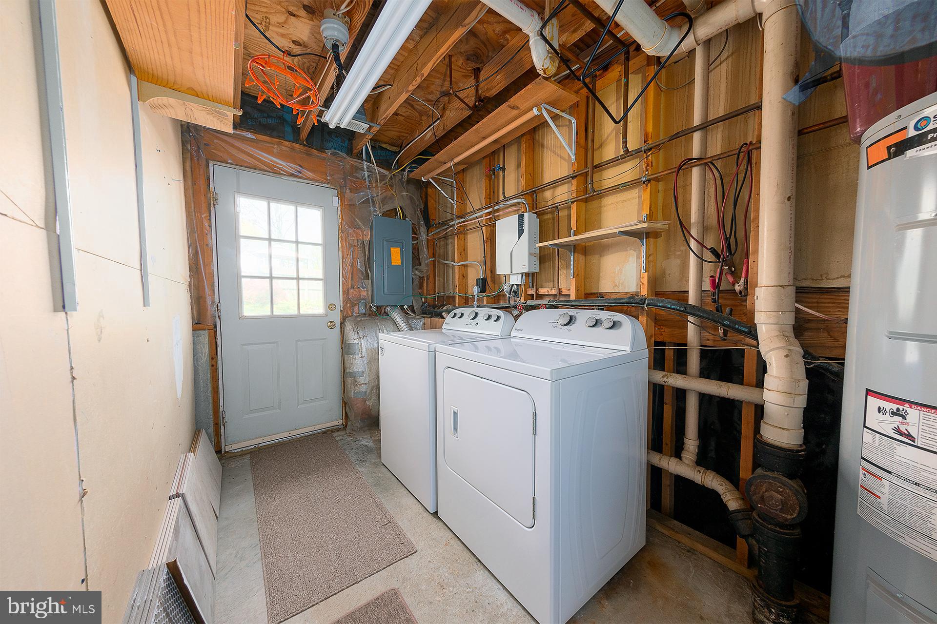 9438 Northgate Road Laurel, MD 20723 - Photo 27 of 40 Laundry area with door and walk up to back yard