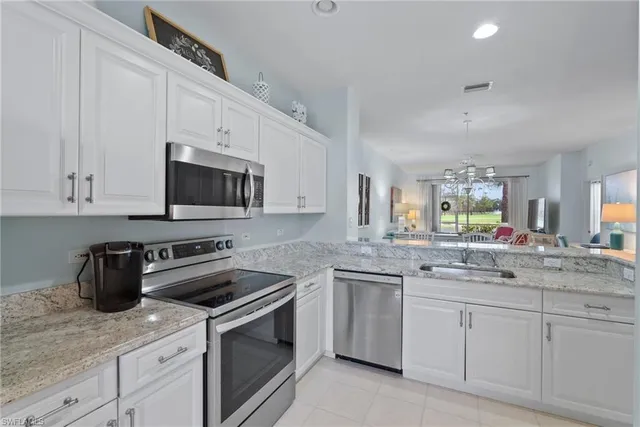 a bathroom with a toilet and a shower curtain