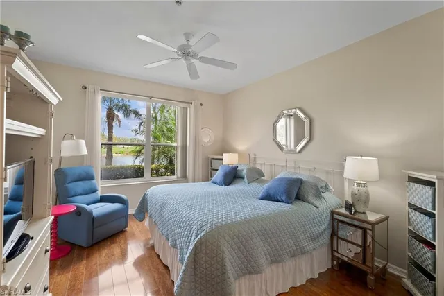 a view of a chair and tables in the balcony