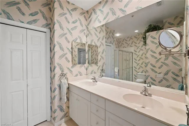 a view of a lake with a yard