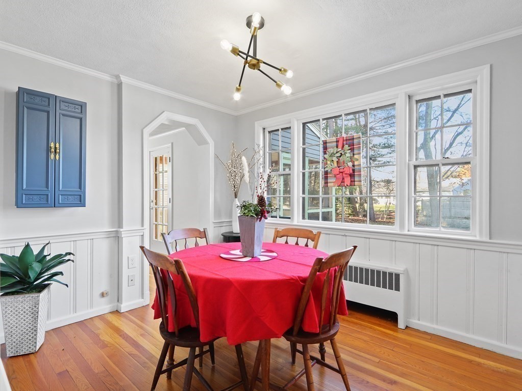 93 Meadowbrook Road Needham, MA 02492 - Photo 13 of 34 a view of a dining room with furniture window and wooden floor