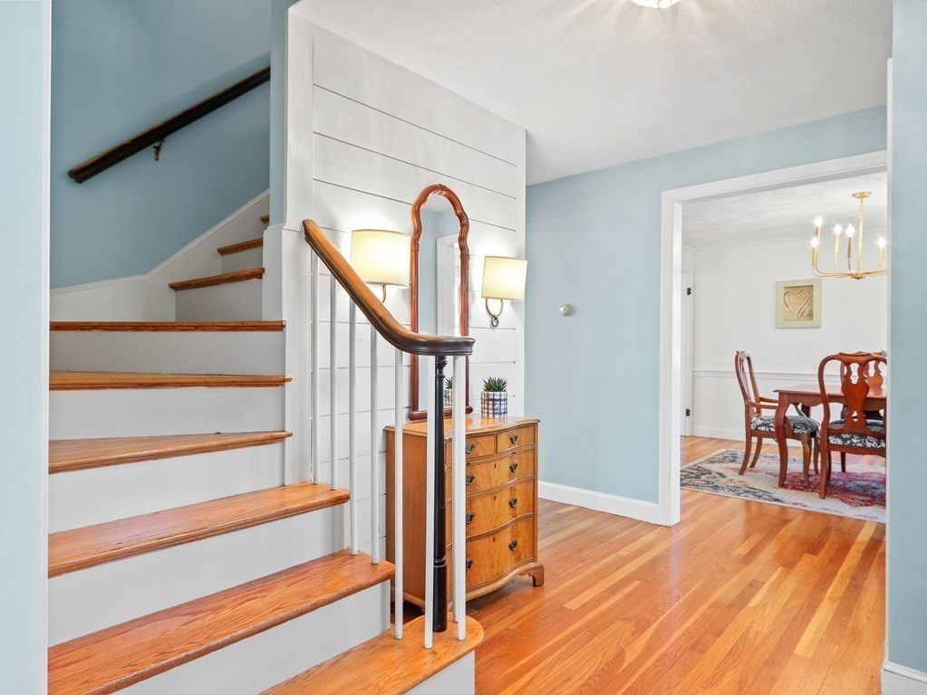 93 Meadowbrook Road Needham, MA 02492 - Photo 15 of 34 a view of a livingroom with furniture and wooden floor