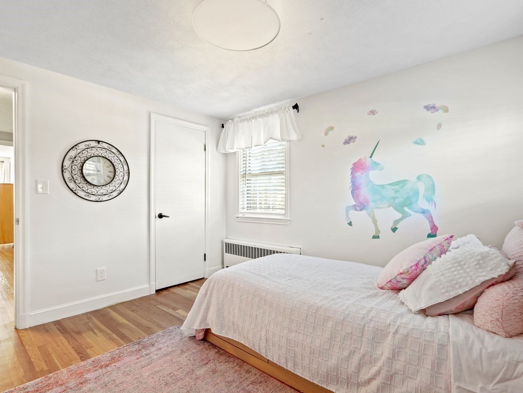 93 Meadowbrook Road Needham, MA 02492 - Photo 18 of 34 a bedroom with a bed and a window