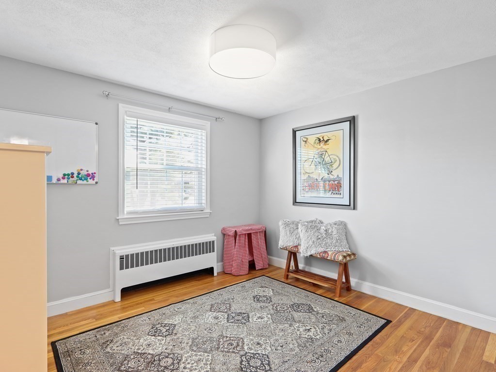 93 Meadowbrook Road Needham, MA 02492 - Photo 20 of 34 a bedroom with furniture and a window