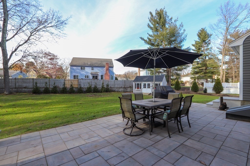93 Meadowbrook Road Needham, MA 02492 - Photo 2 of 34 a view of a patio with a table and chairs