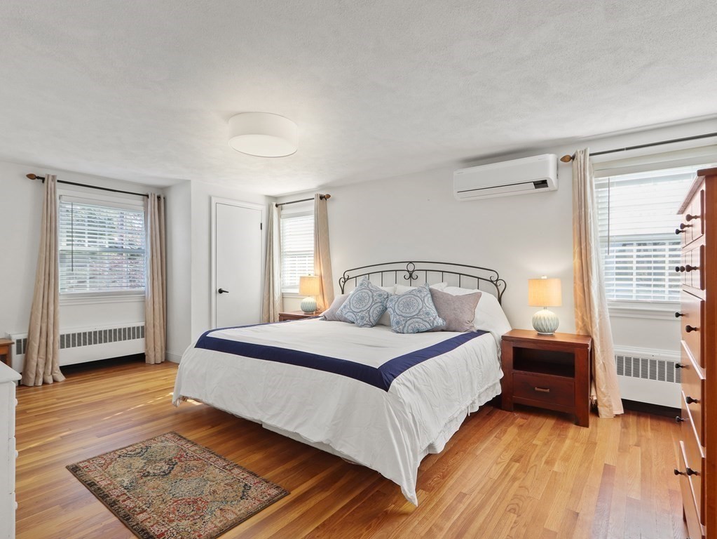 93 Meadowbrook Road Needham, MA 02492 - Photo 22 of 34 a bedroom with a bed and a window