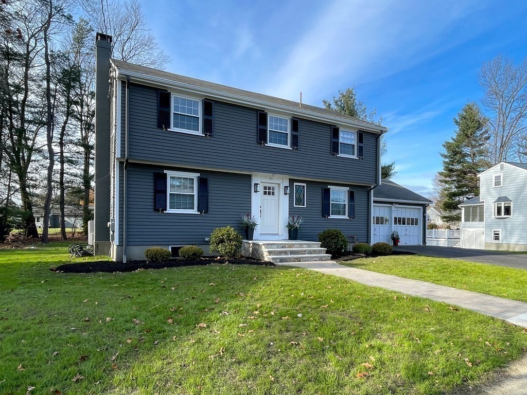 93 Meadowbrook Road Needham, MA 02492 - Photo 29 of 34 a front view of a house with a yard and trees