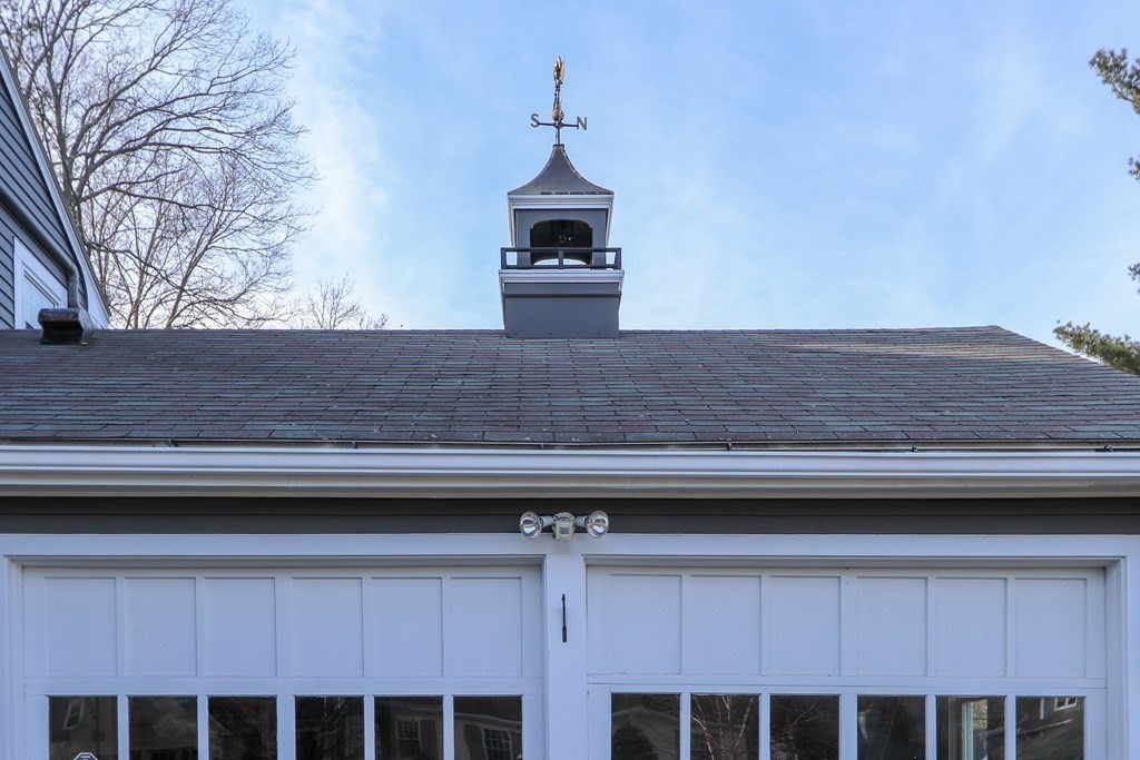 93 Meadowbrook Road Needham, MA 02492 - Photo 31 of 34 a kitchen with a sink and cabinets
