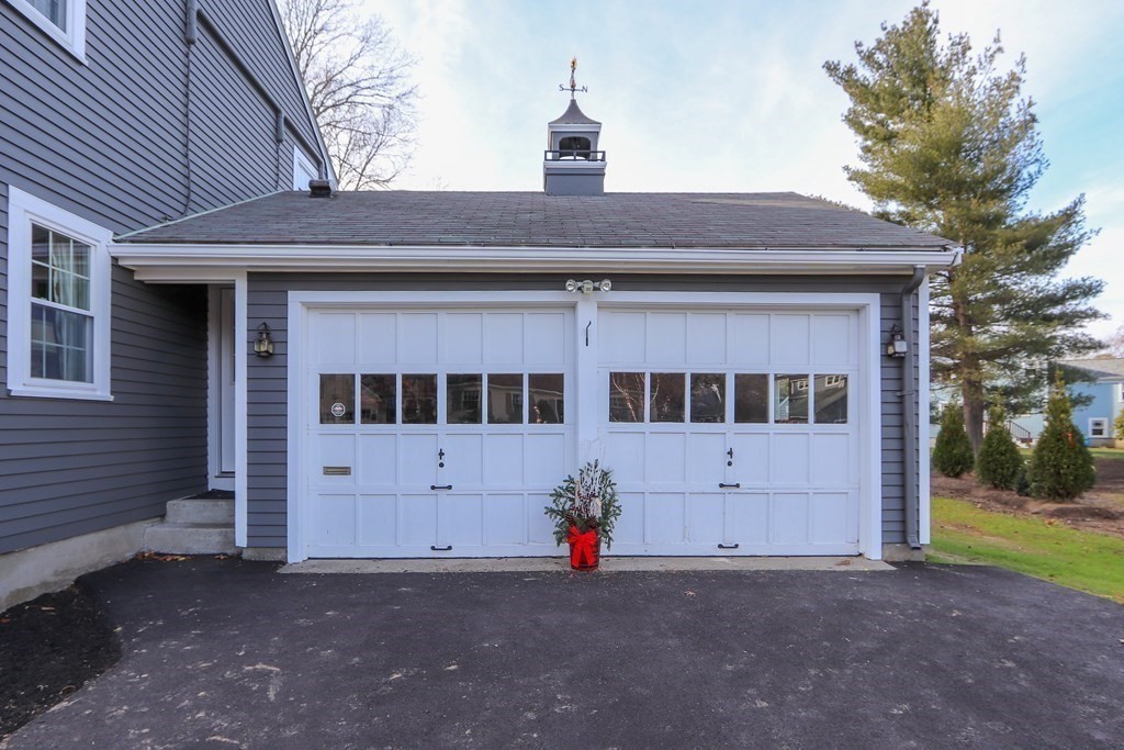 93 Meadowbrook Road Needham, MA 02492 - Photo 32 of 34 a view of a house with a snow and a yard
