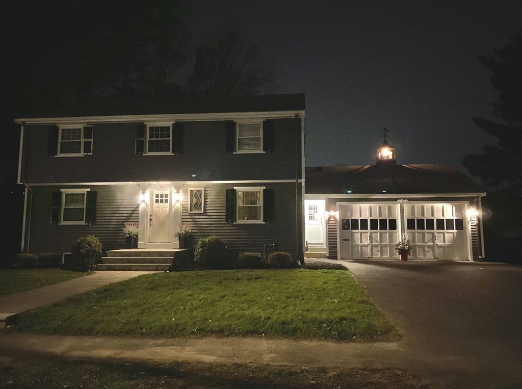 93 Meadowbrook Road Needham, MA 02492 - Photo 33 of 34 a front view of a house with a yard