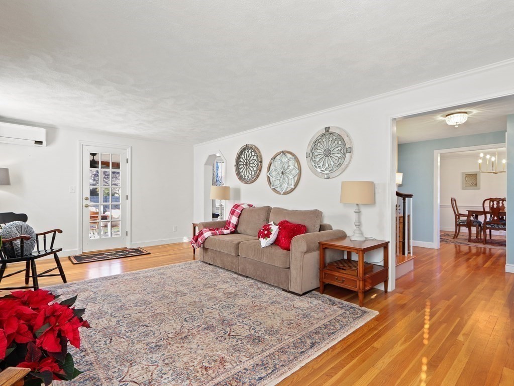 93 Meadowbrook Road Needham, MA 02492 - Photo 8 of 34 a living room with furniture and wooden floor