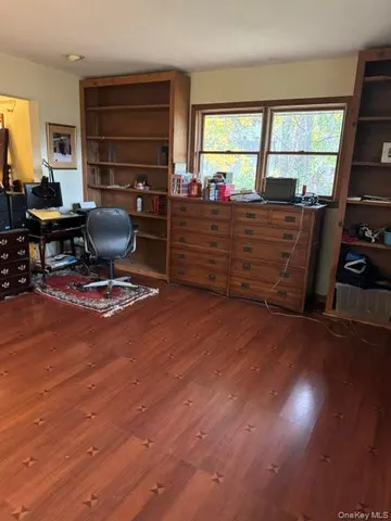 a room with furniture and window