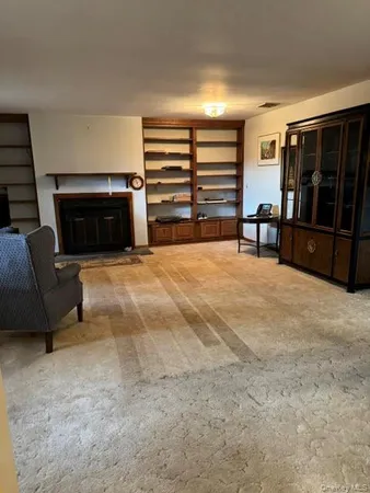 a view of livingroom with furniture and staircase