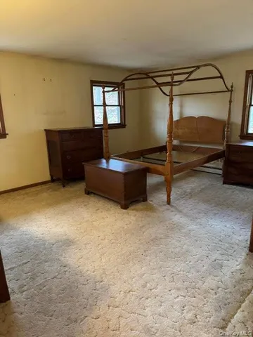 a room with furniture and a window