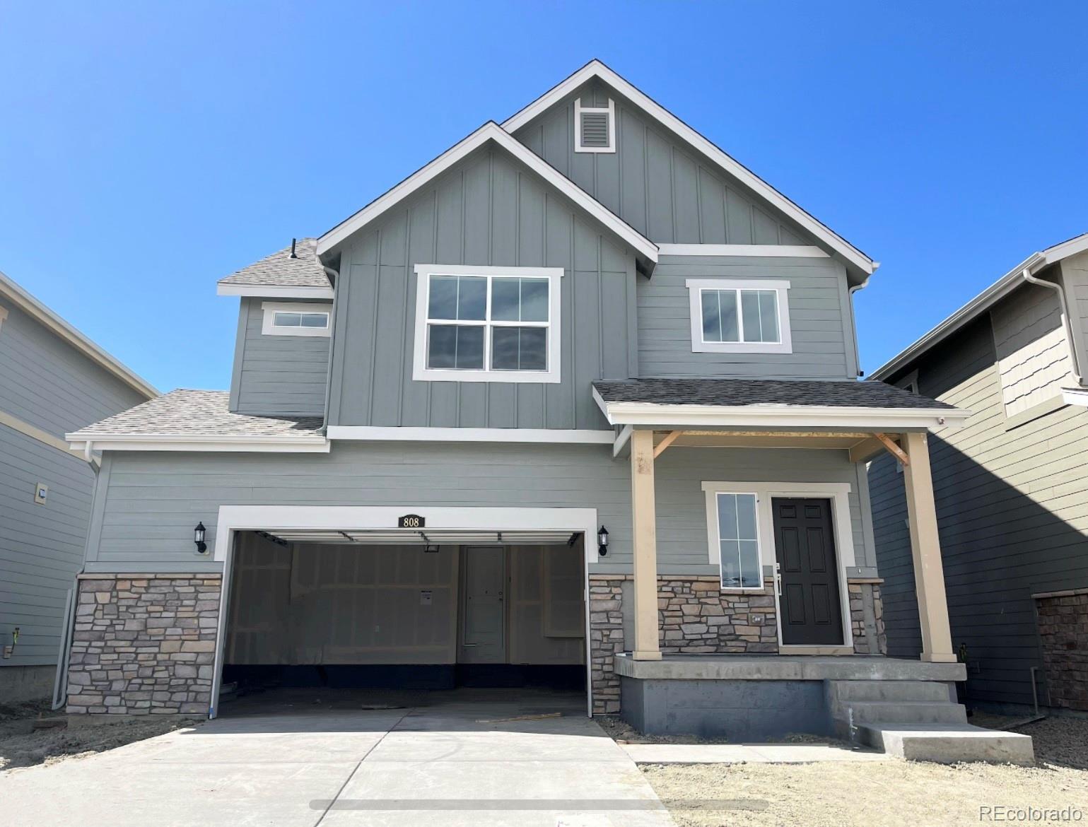 808 Yankee Boy Loop Elizabeth, CO 80107 - Photo 1 of 12 a front view of a house with a garage