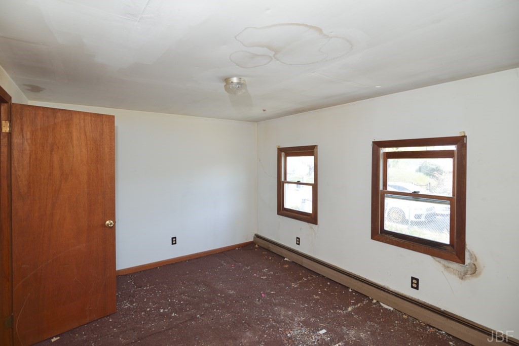 495 Chicago Street Fall River, MA 02721 - Photo 13 of 26 a view of an empty room with a window
