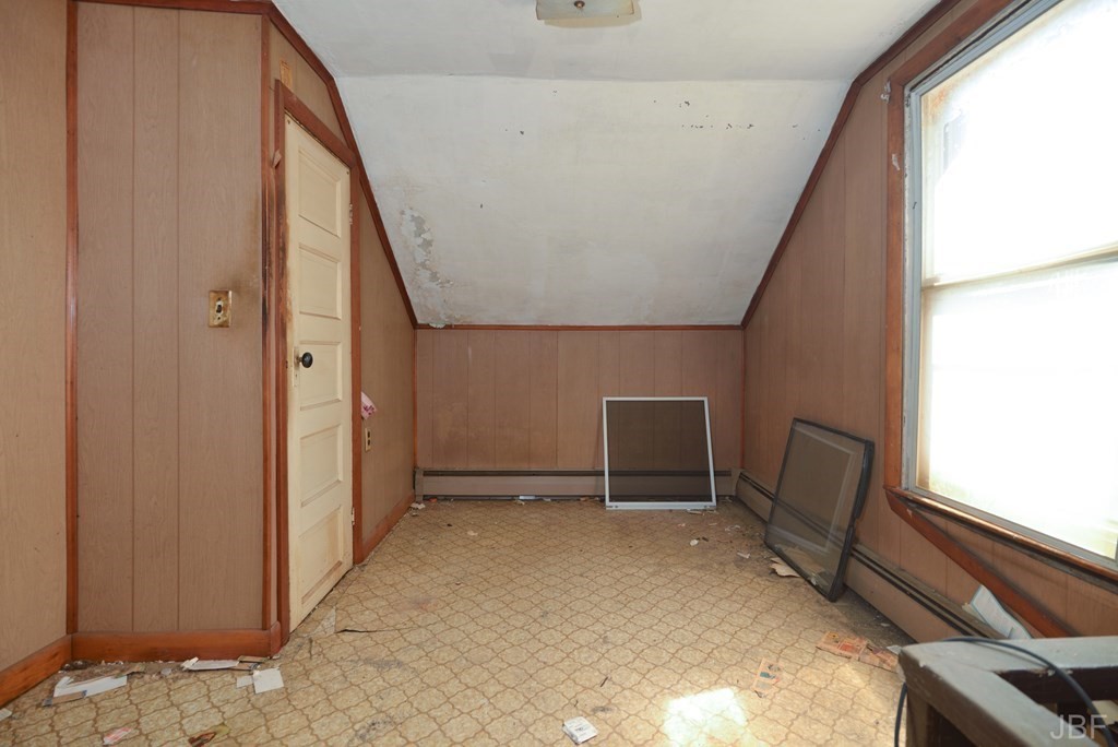 495 Chicago Street Fall River, MA 02721 - Photo 17 of 26 a view of an empty room with a window