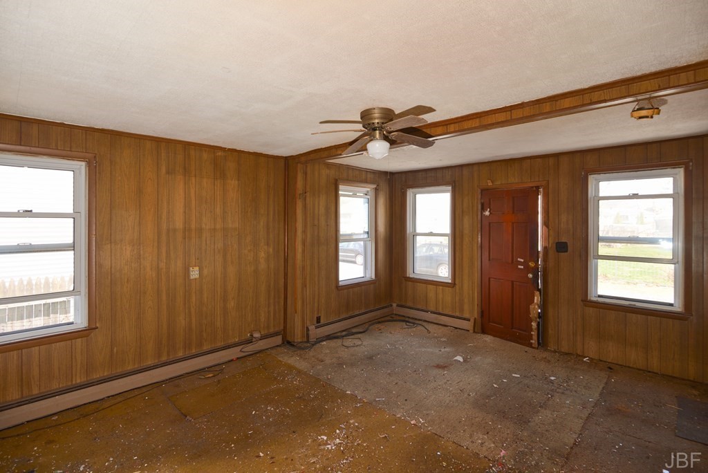 495 Chicago Street Fall River, MA 02721 - Photo 5 of 26 a view of an empty room with a window