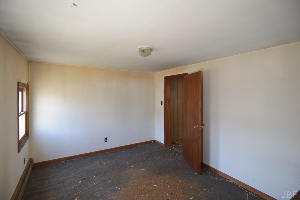 495 Chicago Street Fall River, MA 02721 - Photo 7 of 26 a view of a room with an empty space