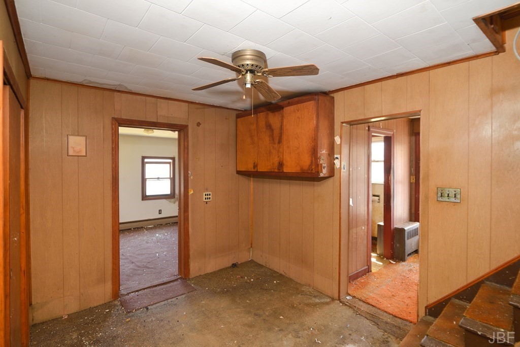 495 Chicago Street Fall River, MA 02721 - Photo 9 of 26 an empty room and windows