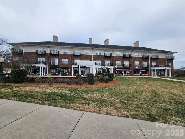 front view of a house with a swimming pool