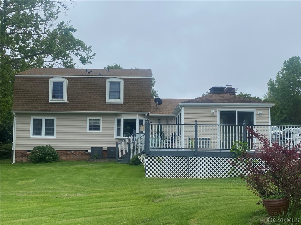 2720 Kinvan Road Henrico, VA 23231 - Photo 10 of 38 a front view of a house with a garden