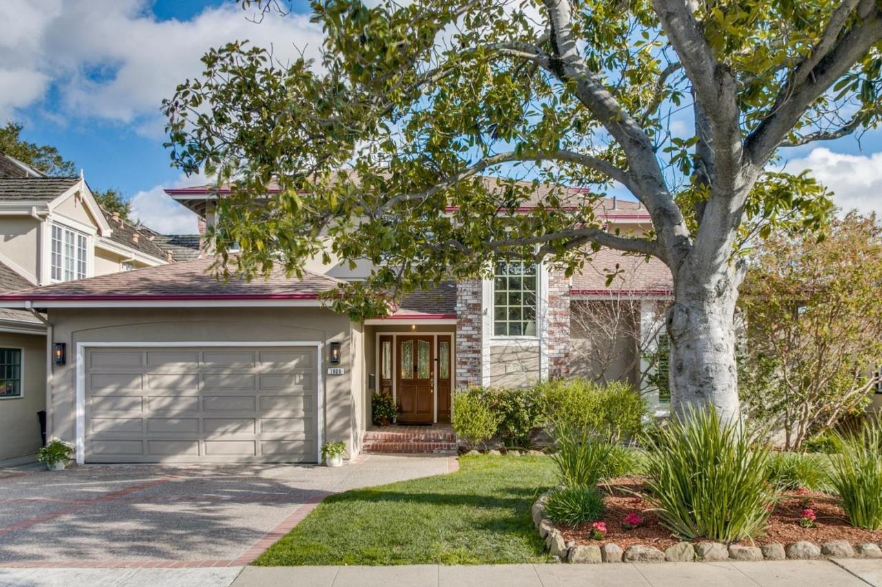 1909 Ray Drive Burlingame, CA 94010 - Photo 1 of 10 a front view of a house with garden