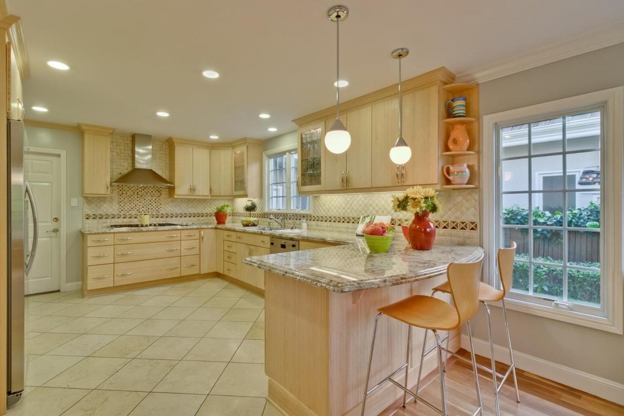 1909 Ray Drive Burlingame, CA 94010 - Photo 3 of 10 a kitchen with a sink cabinets and window