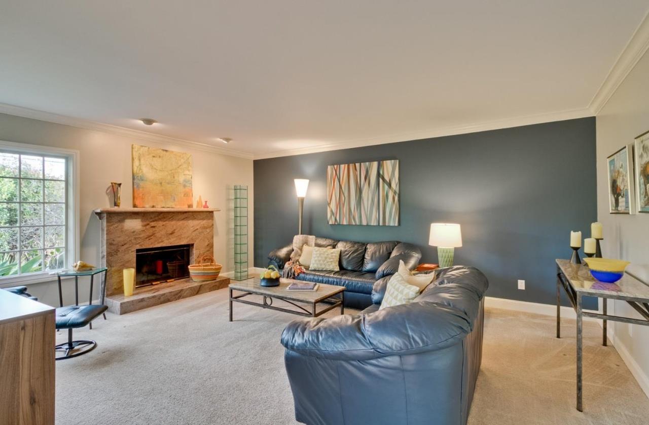 1909 Ray Drive Burlingame, CA 94010 - Photo 7 of 10 a living room with furniture and a fireplace