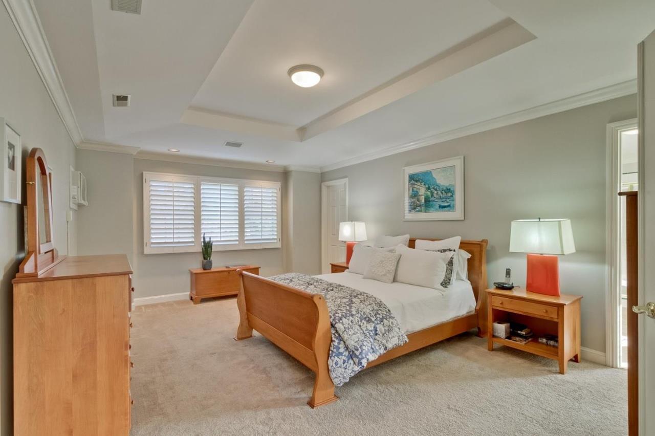 1909 Ray Drive Burlingame, CA 94010 - Photo 9 of 10 a bedroom with a bed and a couch