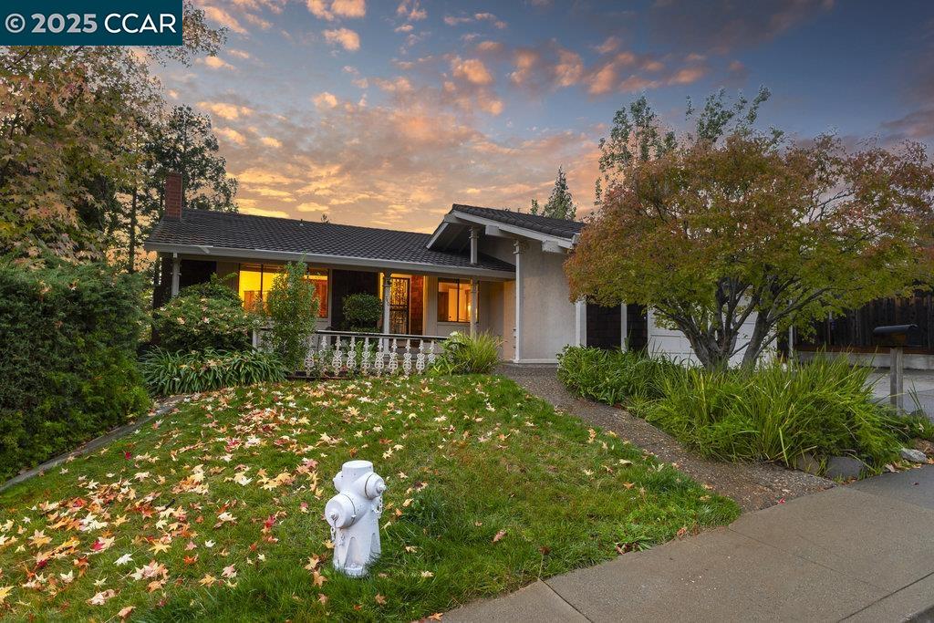 740 Sunflower Court Concord, CA 94518 - Photo 5 of 13 a front view of a house with a yard