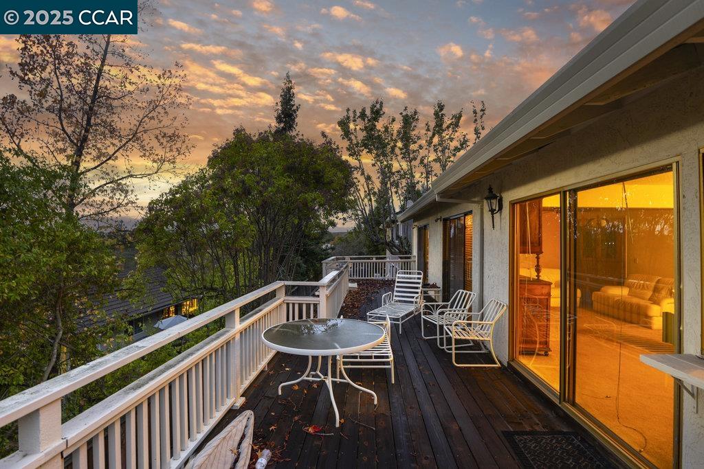 740 Sunflower Court Concord, CA 94518 - Photo 10 of 13 a balcony with wooden floor and outdoor seating