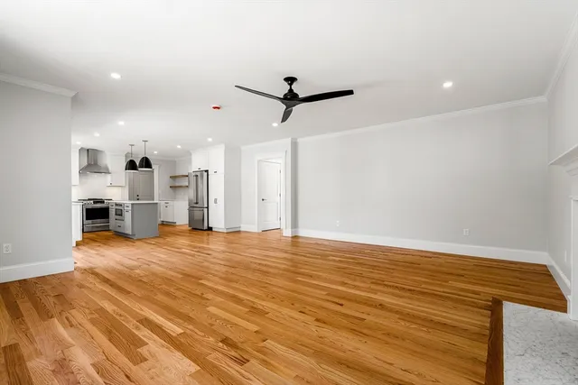 a view of a livingroom with a kitchen