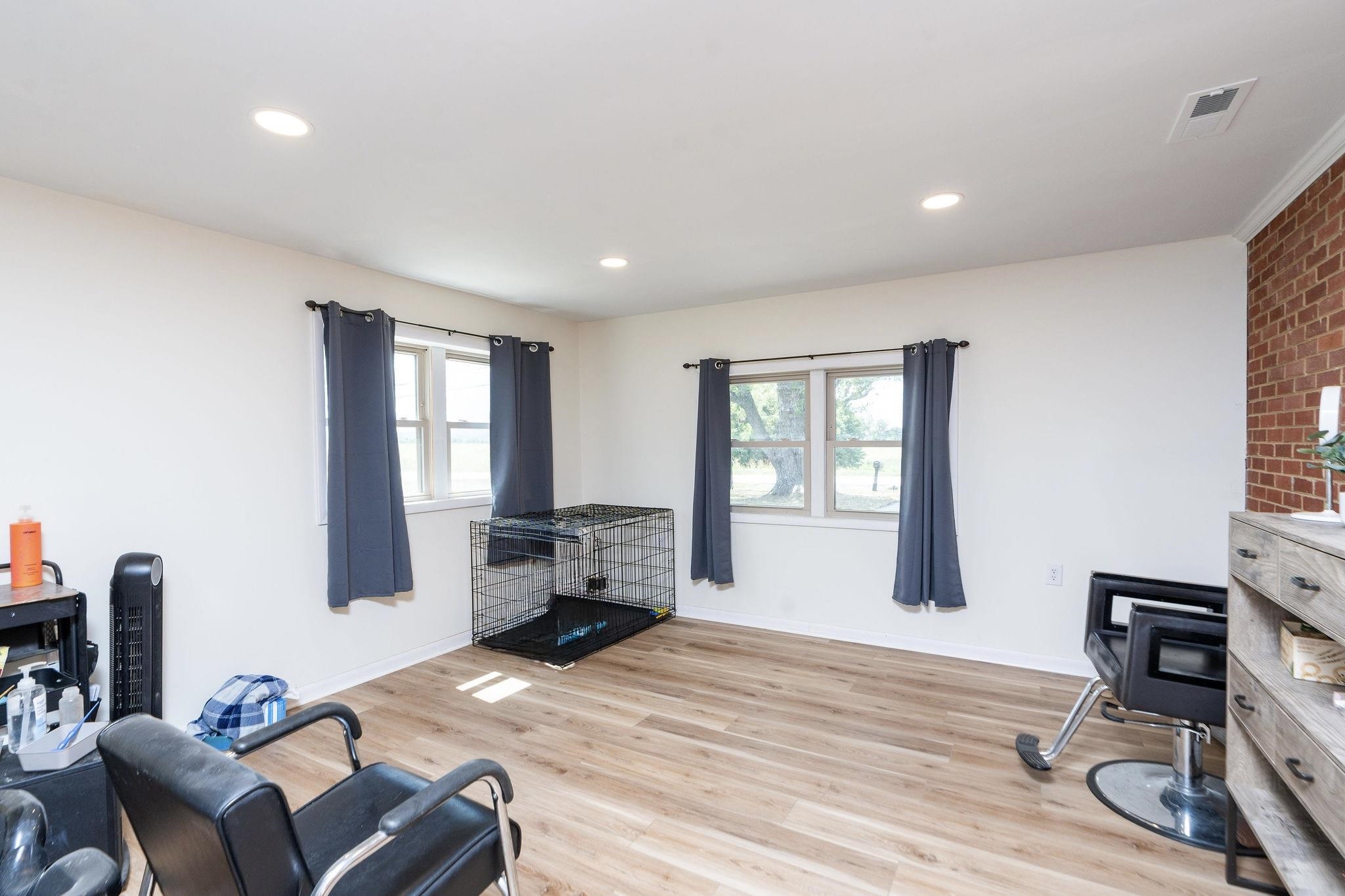 1064 Ladd Road Waynesboro, VA 22980 - Photo 23 of 51 a view of a livingroom with furniture hardwood floor and workspace