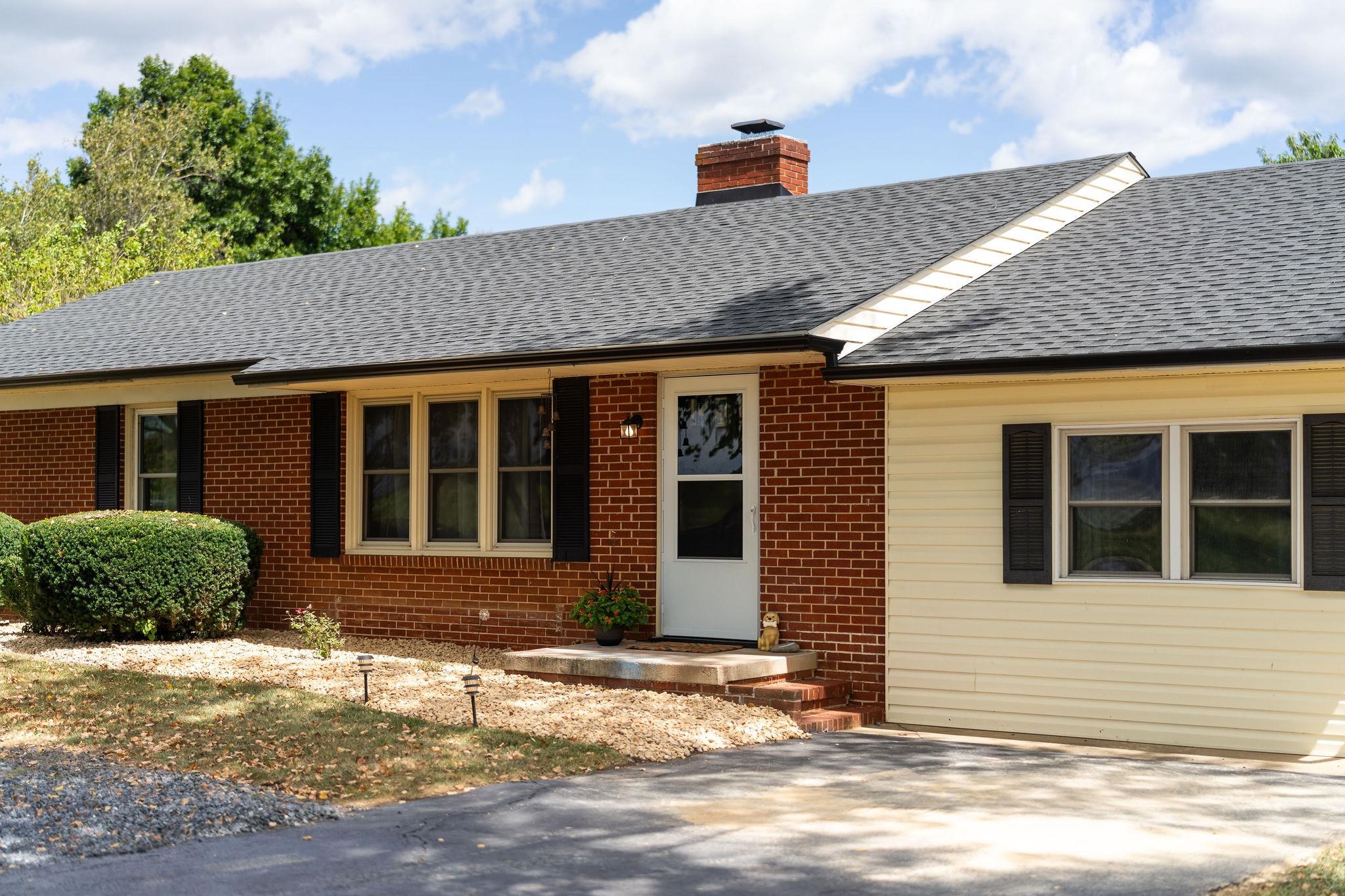 1064 Ladd Road Waynesboro, VA 22980 - Photo 3 of 51 a front view of a house with a yard