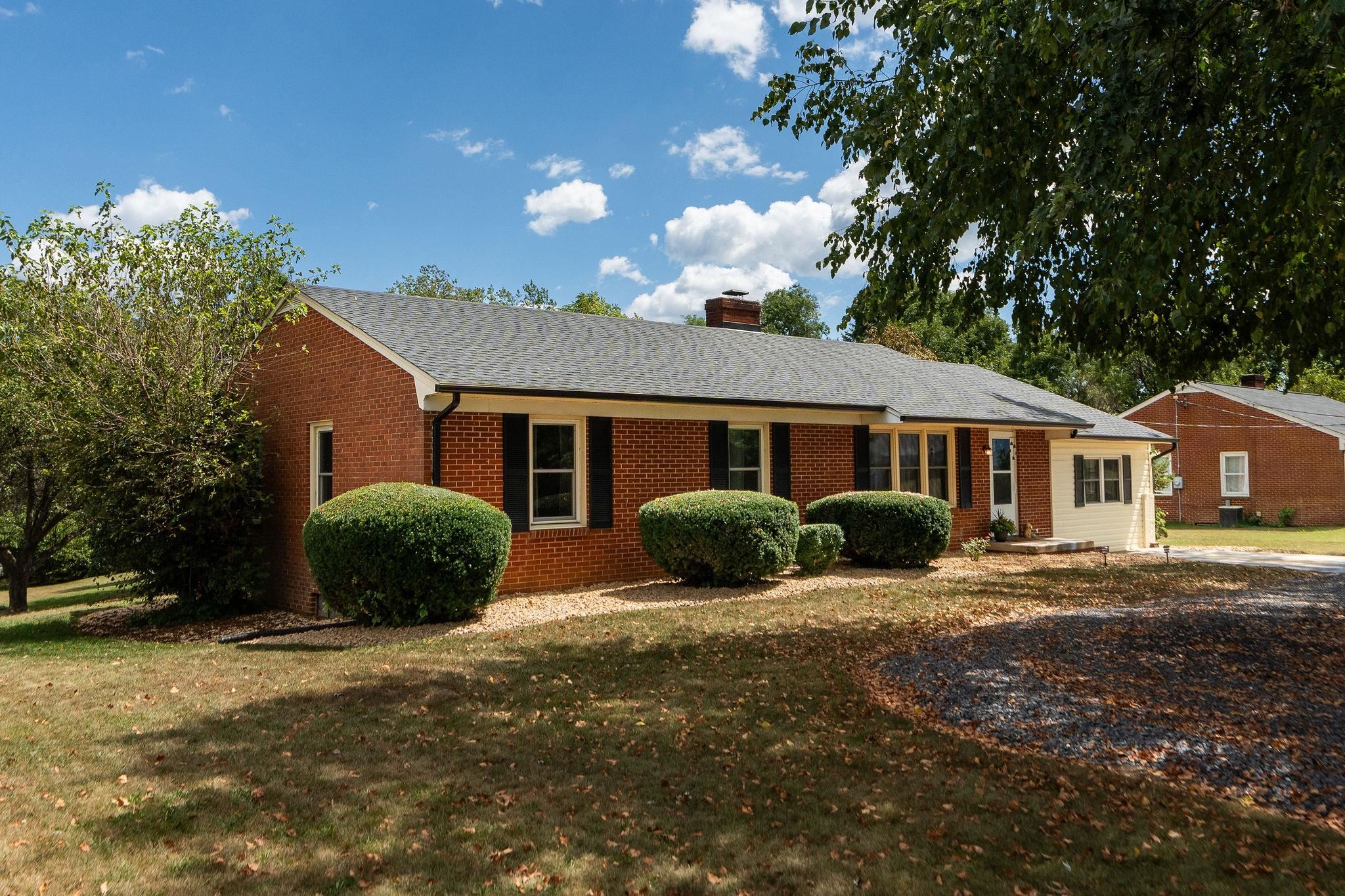 1064 Ladd Road Waynesboro, VA 22980 - Photo 49 of 51 a view of a house with a yard and potted plants