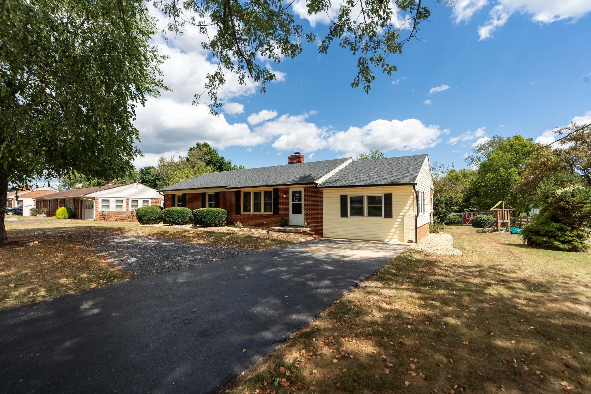 1064 Ladd Road Waynesboro, VA 22980 - Photo 50 of 51 a front view of a house with a garden