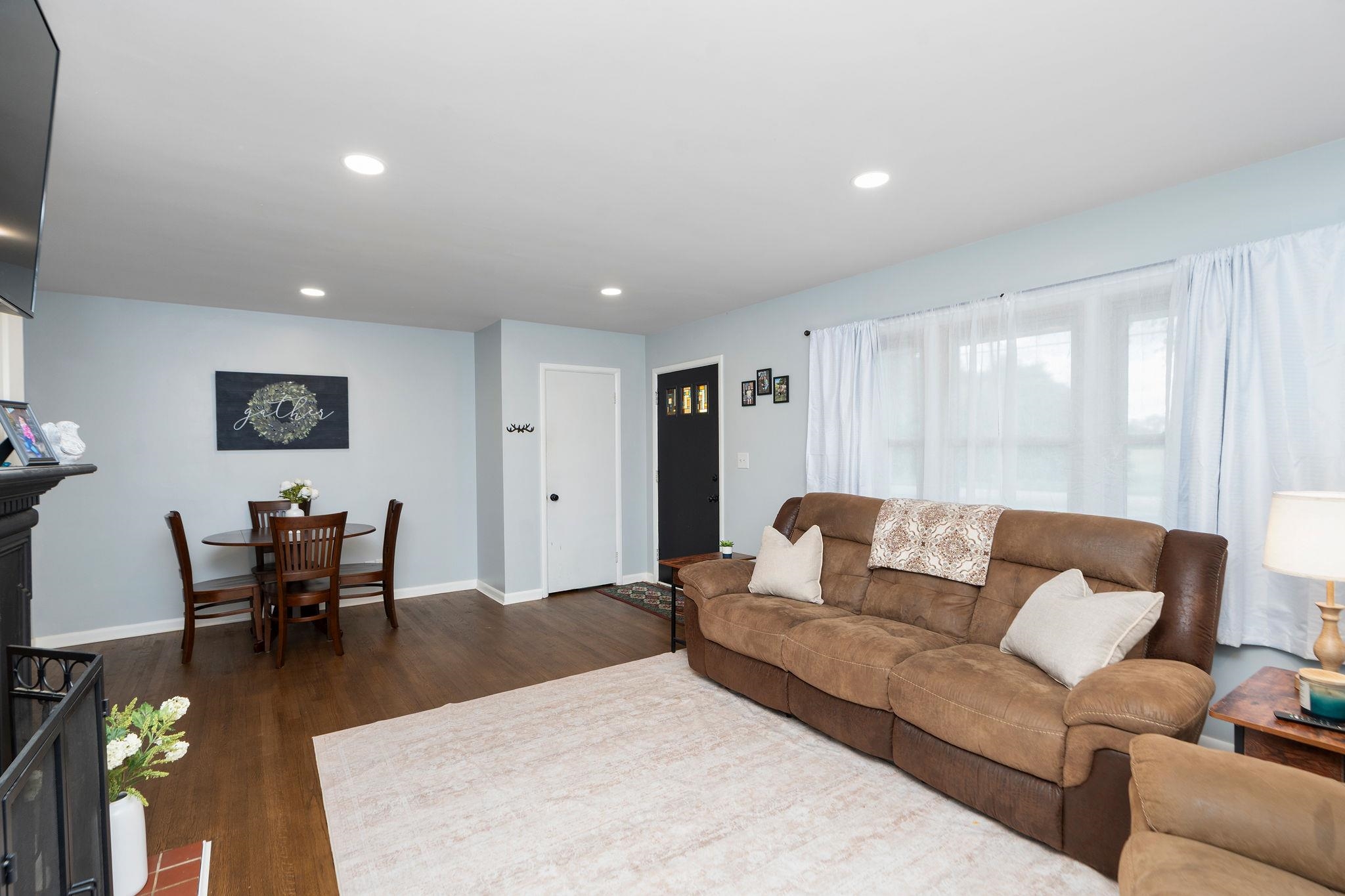 1064 Ladd Road Waynesboro, VA 22980 - Photo 7 of 51 a living room with furniture and a wooden floor