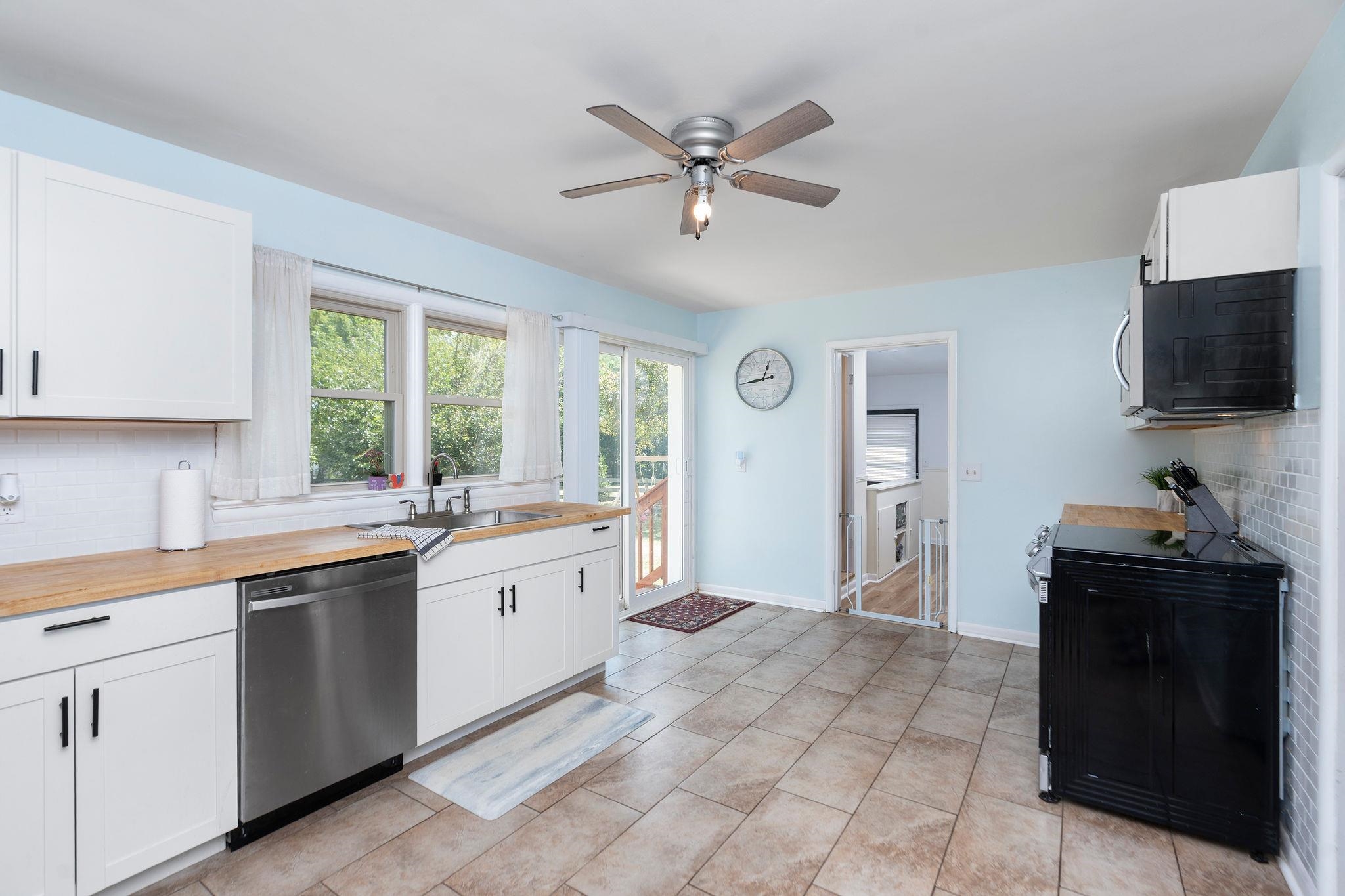 1064 Ladd Road Waynesboro, VA 22980 - Photo 9 of 51 a kitchen with a sink and cabinets