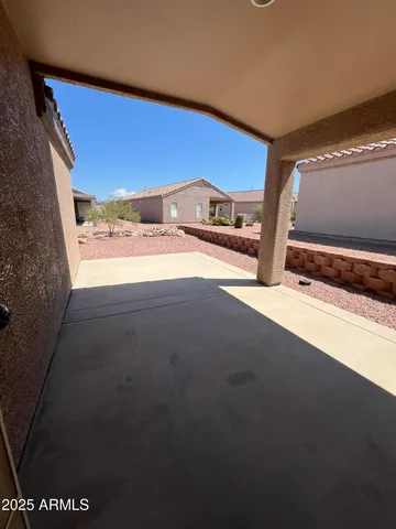 a view of a living room with a flat screen tv