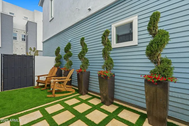 a backyard of a house with seating space