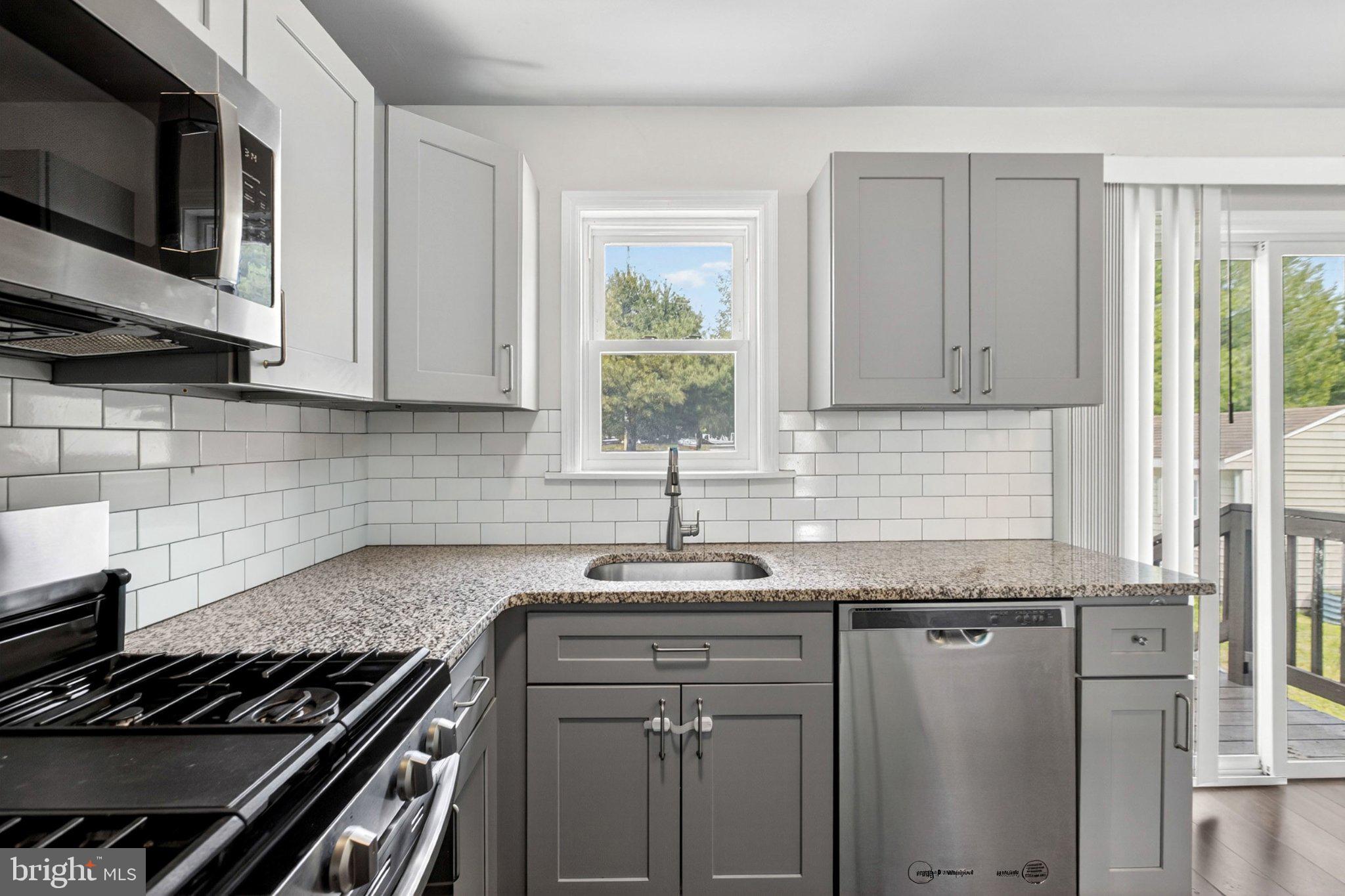 114 Sunset Drive Mount Royal, NJ 08061 - Photo 15 of 74 Modern kitchen with sleek finishes.