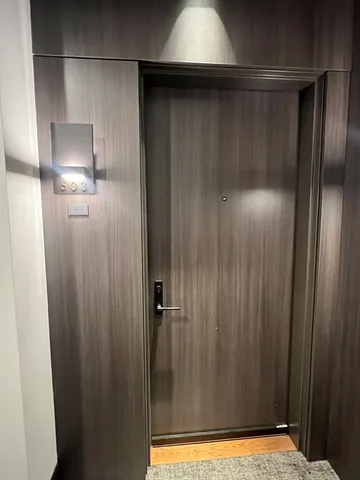 a kitchen with stainless steel appliances a sink stove and refrigerator