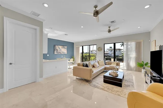 a spacious bedroom with a bed and a table in it