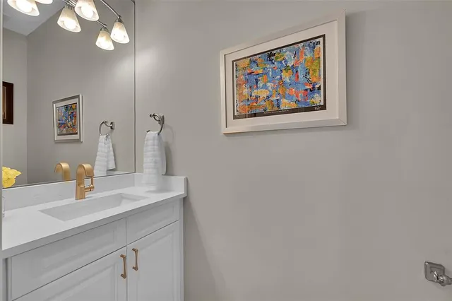 a view of a chairs and table in patio