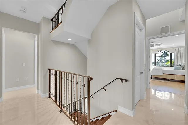 a view of balcony with outdoor seating and city view