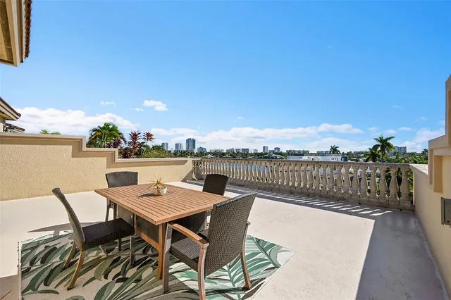 a table with chairs and table in front of it