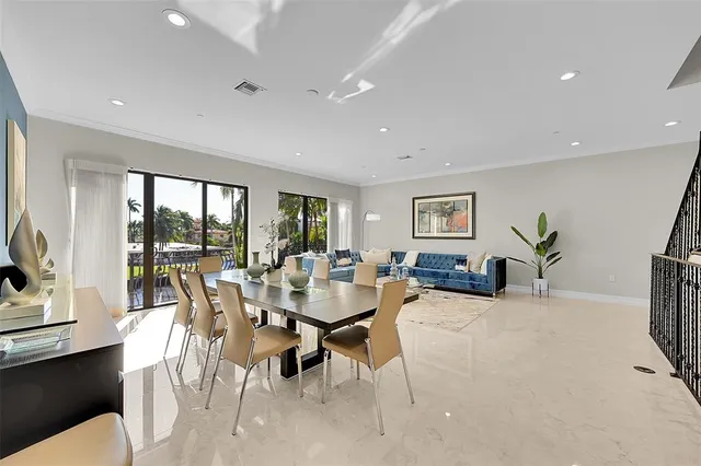 a living room with furniture or couch and a wooden floor